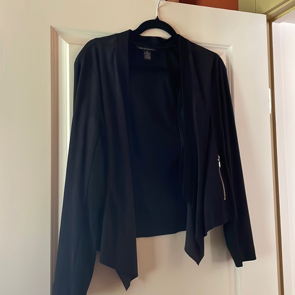 From the office to dinner  jacket in perfect shape! Like new never worn.